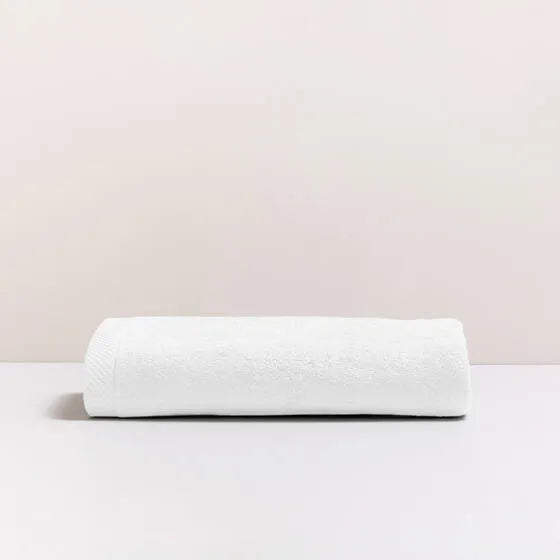 Luxe ivoor Florence badhanddoek van 100% GOTS-katoen, 600 g/m², hoge kwaliteit, zacht en absorberend.