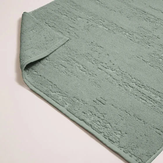 Duurzame eucalyptus Luna badmat van 67% gerecycled katoen en 33% polyester, 500 g/m², hoge kwaliteit, zacht, absorberend en sneldrogend.