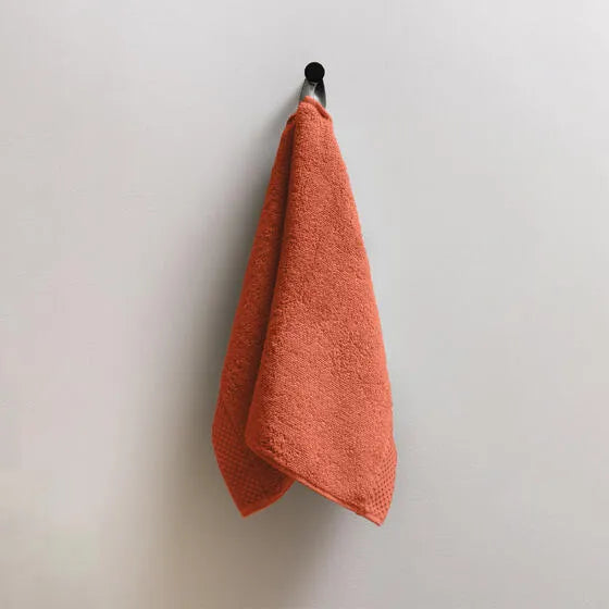 Luxe koraal Florence gastendoeken (3 stuks) van 100% GOTS-katoen, 600 g/m², hoge kwaliteit, zacht en absorberend.