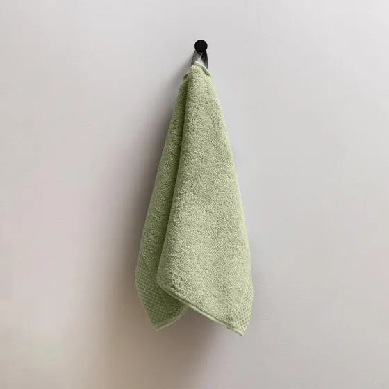 Luxe lichtgroen Florence gastendoeken (3 stuks) van 100% GOTS-katoen, 600 g/m², hoge kwaliteit, zacht en absorberend.