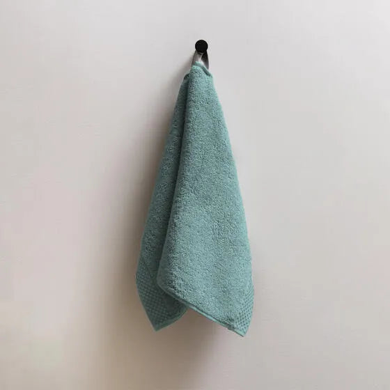 Luxe mineraalblauw Florence gastendoeken (3 stuks) van 100% GOTS-katoen, 600 g/m², hoge kwaliteit, zacht en absorberend.