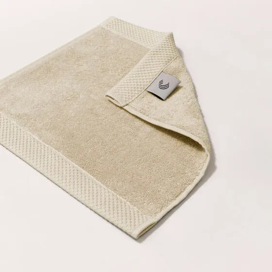 Luxe latte Florence gezichtsdoeken (4 stuks) van 100% GOTS-katoen, 600 g/m², hoge kwaliteit, zacht en absorberend.