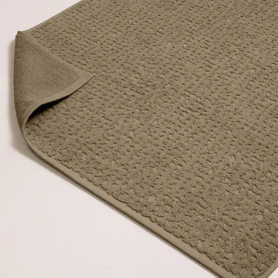 Luxe khaki Florence badmat van 100% GOTS-katoen, 600 g/m², hoge kwaliteit, zacht en absorberend.