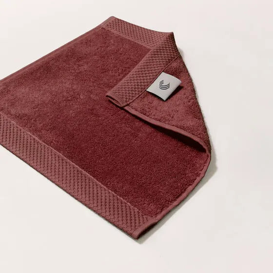 Luxe bordeaux Florence gezichtsdoeken (4 stuks) van 100% GOTS-katoen, 600 g/m², hoge kwaliteit, zacht en absorberend.