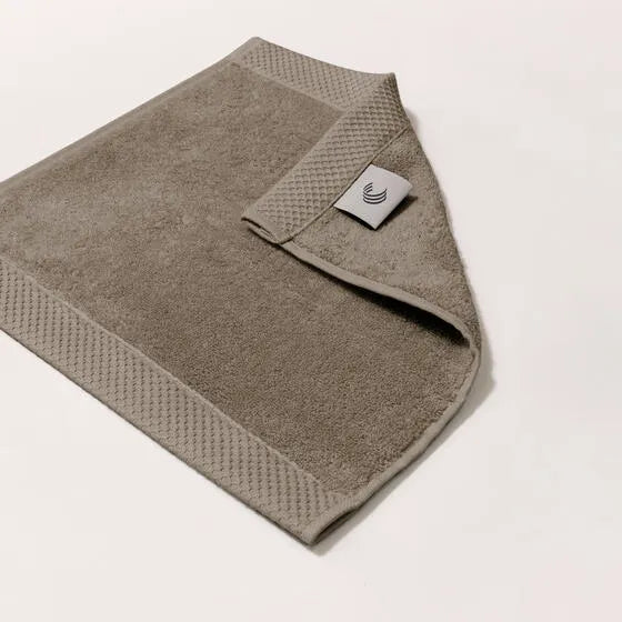 Luxe khaki Florence gezichtsdoeken (4 stuks) van 100% GOTS-katoen, 600 g/m², hoge kwaliteit, zacht en absorberend.