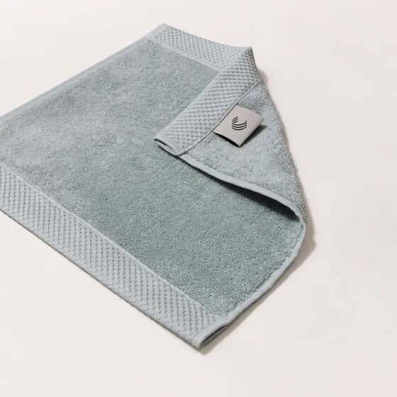 Luxe zilverblauw Florence gezichtsdoeken (4 stuks) van 100% GOTS-katoen, 600 g/m², hoge kwaliteit, zacht en absorberend.